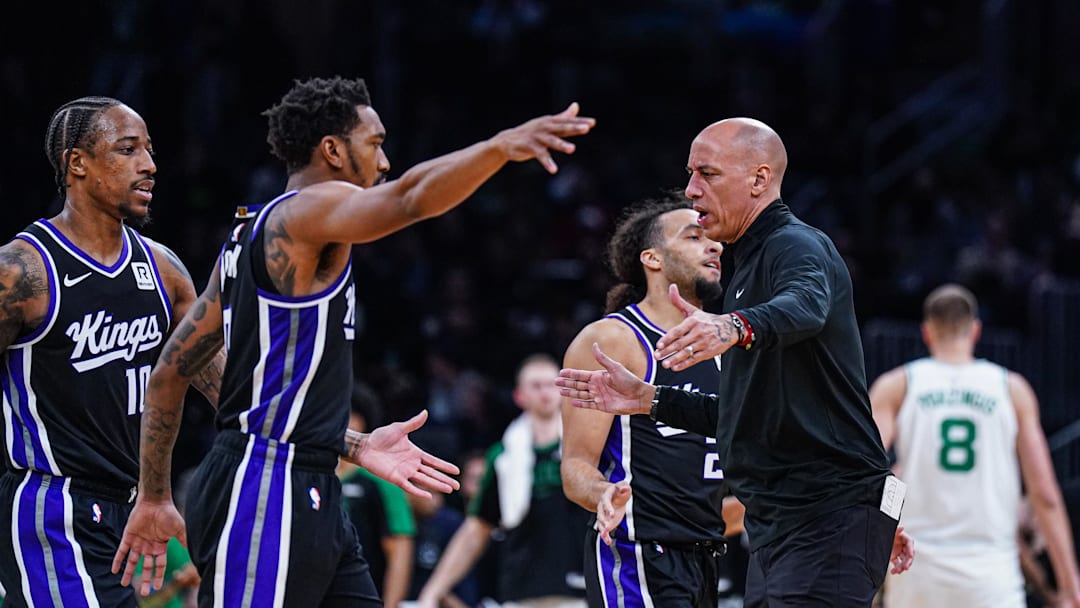 Jan 10, 2025; Boston, Massachusetts, USA; Sacramento Kings interim head coach Doug Christie reacts with players during a break against the Boston Celtics at TD Garden. Mandatory Credit: David Butler II-Imagn Images