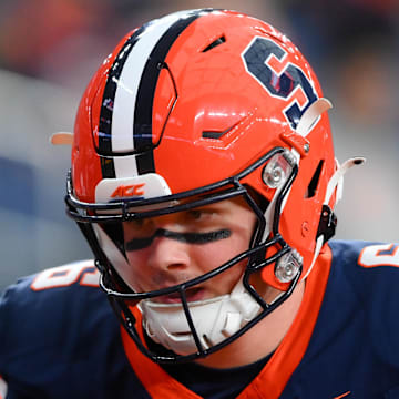 Nov 30, 2024; Syracuse, New York, USA; Syracuse Orange quarterback Kyle McCord (6) warms up prior to the game against the Miami Hurricanes at the JMA Wireless Dome. Mandatory Credit: Rich Barnes-Imagn Images