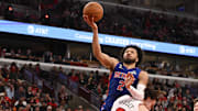 Oct 22, 2025; Chicago, Illinois, USA;  Detroit Pistons guard Cade Cunningham (2) shoots over Chicago Bulls guard Josh Giddey (3) during the second half at United Center. Mandatory Credit: Matt Marton-Imagn Images