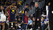 Mar 13, 2025; San Francisco, California, USA; Golden State Warriors head coach Steve Kerr (right) confers with players Jimmy Butler III (10) and Gary Payton II (0) during the second quarter at Chase Center. Mandatory Credit: D. Ross Cameron-Imagn Images