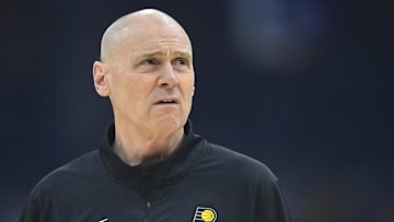 Apr 13, 2025; Cleveland, Ohio, USA; Indiana Pacers head coach Rick Carlisle stands on the court during a timeout in the first quarter against the Cleveland Cavaliers at Rocket Arena. Mandatory Credit: David Richard-Imagn Images