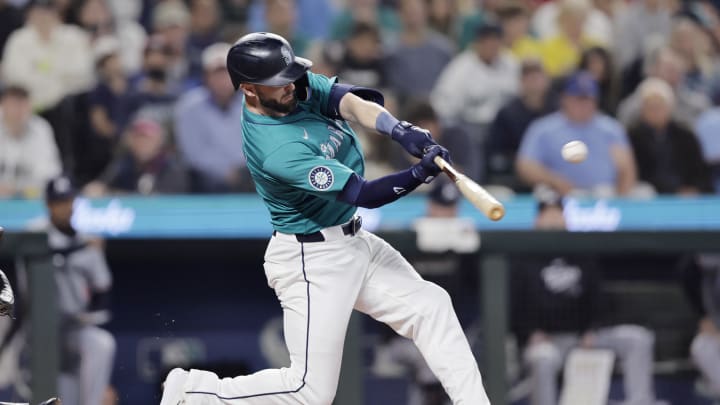 Seattle Mariners right fielder Mitch Haniger (17) hits a solo home run against the Minnesota Twins during the third inning at T-Mobile Park on June 29.