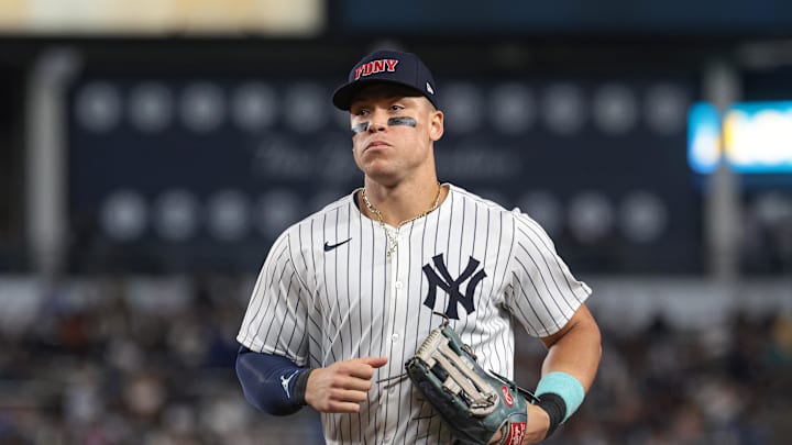 Sep 11, 2024; Bronx, New York, USA; New York Yankees center fielder Aaron Judge (99) runs off the field after the top so the eighth inning against the Kansas City Royals at Yankee Stadium.