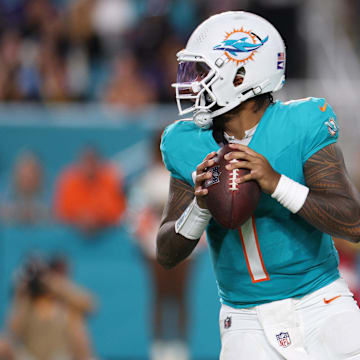 Miami Dolphins quarterback Tua Tagovailoa (1) throws downfield during the third quarter against the Baltimore Ravens at Hard Rock Stadium. 