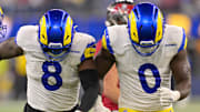 Nov 23, 2025; Inglewood, California, USA; Los Angeles Rams linebacker Jared Verse (8) and linebacker Byron Young (0) celebrate after a sack of Tampa Bay Buccaneers quarterback Teddy Bridgewater (10) in the second half at SoFi Stadium. Mandatory Credit: Jayne Kamin-Oncea-Imagn Images