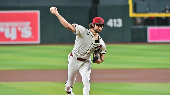 Jul 31, 2024; Phoenix, Arizona, USA;  Arizona Diamondbacks pitcher Zac Gallen (23) throws against the Washington Nationals in the first inning at Chase Field. Mandatory Credit: Matt Kartozian-USA TODAY Sports