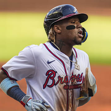 Atlanta Braves right fielder Ronald Acuna Jr. scores a run.