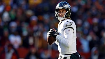 Dec 22, 2024; Landover, Maryland, USA; Philadelphia Eagles quarterback Kenny Pickett (7) throws a pass during the first quarter against the Washington Commanders at Northwest Stadium.
