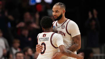 Auburn Tigers guard Tahaad Pettiford (0) celebrates with Auburn Tigers forward Johni Broome (4) 