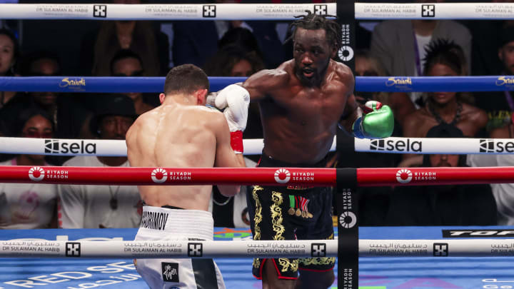 Crawford (right) continues to succeed as he moves up weight classes.