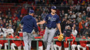 May 16, 2024; Boston, Massachusetts, USA;  Tampa Bay Rays manager Kevin Cash (16) relieves pitcher Jason Adam.