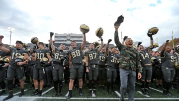 Nov 11, 2023; West Point, New York, USA; Army Black Knights head coach Jeff Monken celebrates with his team after a 17-14 win against the Holy Cross Crusaders at Michie Stadium. Mandatory Credit: Danny Wild-USA TODAY Sports
