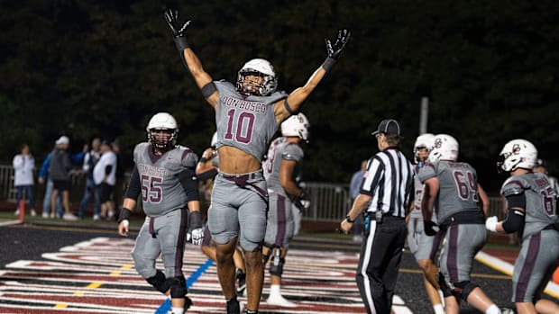 DePaul football at Don Bosco. DB #10 Hunter Ditrano celebrates after scoring a touchdown in the second quarter.