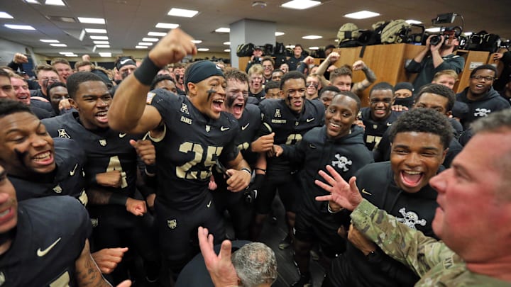 Nov 2, 2024; West Point, New York, USA; The Army Black Knights celebrate in the locker room after a 20-3 win against the Air Force Falcons at Michie Stadium. Nov 2, 2024; West Point, New York, USA; The Army Black Knights celebrate in the locker room after a 20-3 win against the Air Force Falcons at Michie Stadium.