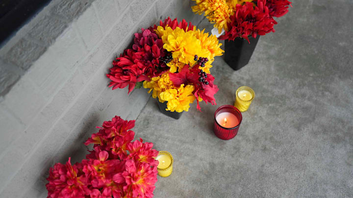 Flowers and candles left outside at the closed Hulk Hogan's Wrestling Shop in Pigeon Forge, Tenn Flowers and candles left outside at the closed Hulk Hogan's Wrestling Shop in Pigeon Forge, Tenn