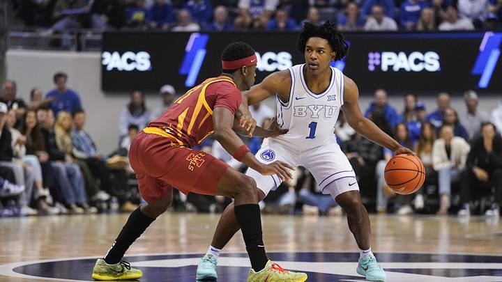 Feb 21, 2026; Provo, Utah, USA; BYU Cougars guard Robert Wright III (1) controls the ball during the first half against the Iowa State Cyclones at Marriott Center. Mandatory Credit: Aaron Baker-Imagn Images
