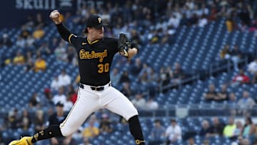 Aug 22, 2024; Pittsburgh, Pennsylvania, USA;  Pittsburgh Pirates starting pitcher Paul Skenes (30) delivers a pitch against the Cincinnati Reds during the first inning at PNC Park. Mandatory Credit: Charles LeClaire-Imagn Images