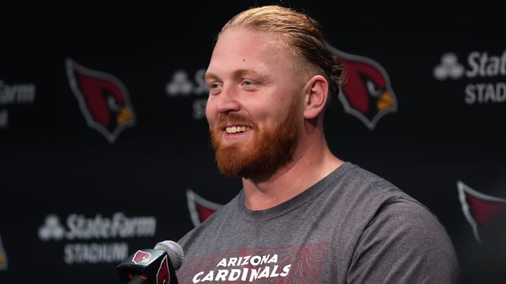 Arizona Cardinals center Hjalte Froholdt (72) speaks to the media during training camp at State Farm Stadium in Glendale on July 25, 2024.