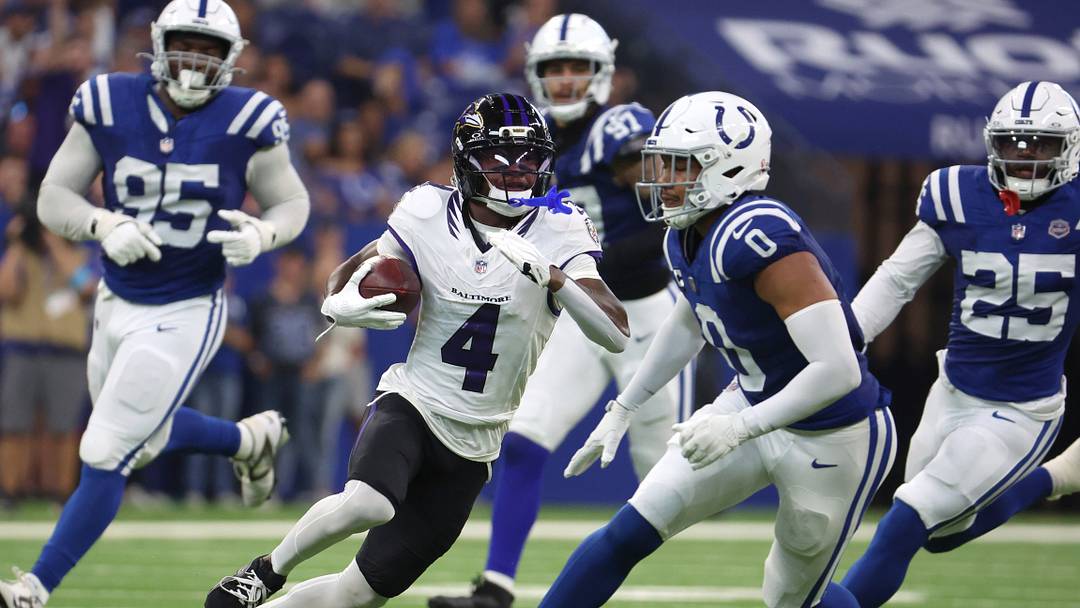 Baltimore Ravens wide receiver Zay Flowers (4) runs with the ball against the Indianapolis Colts at Lucas Oil Stadium. Baltimore Ravens wide receiver Zay Flowers (4) runs with the ball against the Indianapolis Colts at Lucas Oil Stadium.