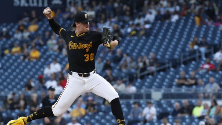 Aug 22, 2024; Pittsburgh, Pennsylvania, USA;  Pittsburgh Pirates starting pitcher Paul Skenes (30) delivers a pitch against the Cincinnati Reds during the first inning at PNC Park. Mandatory Credit: Charles LeClaire-USA TODAY Sports