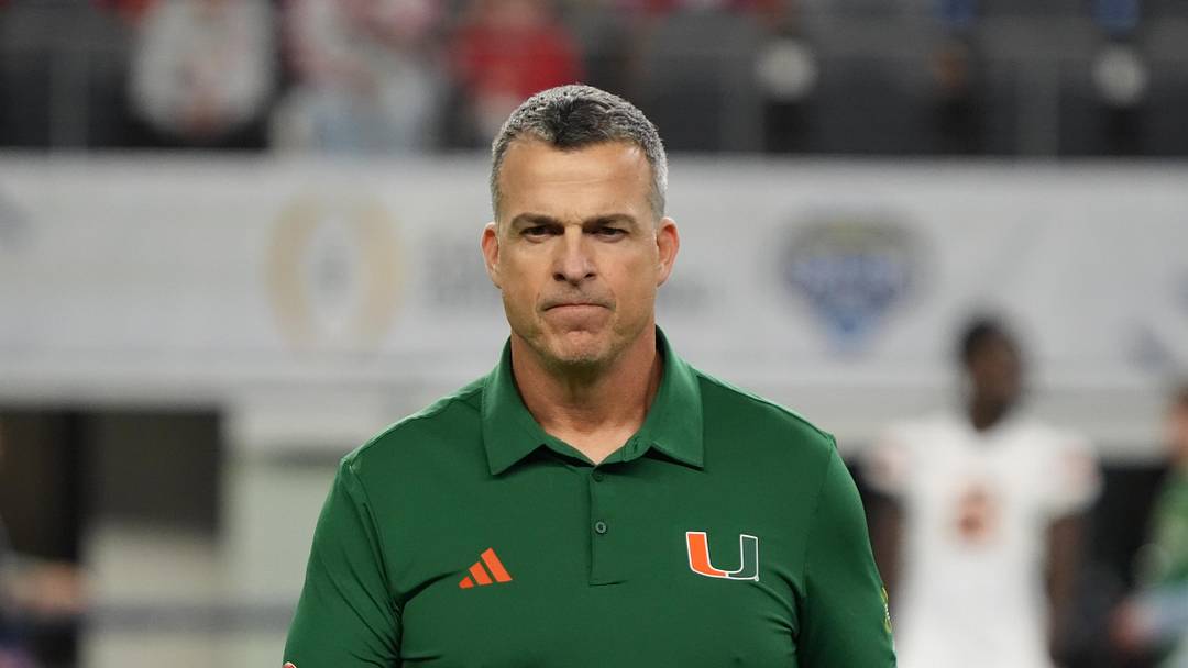 Dec 31, 2025; Arlington, TX, USA; Miami Hurricanes head coach Mario Cristobal looks on before the 2025 Cotton Bowl and quarterfinal game of the College Football Playoff against the Ohio State Buckeyes at AT&T Stadium. Mandatory Credit: Raymond Carlin III-Imagn Images