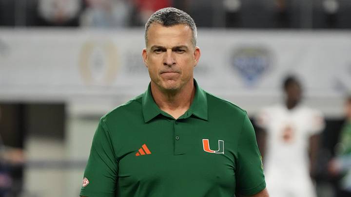 Dec 31, 2025; Arlington, TX, USA; Miami Hurricanes head coach Mario Cristobal looks on before the 2025 Cotton Bowl and quarterfinal game of the College Football Playoff against the Ohio State Buckeyes at AT&T Stadium. Mandatory Credit: Raymond Carlin III-Imagn Images