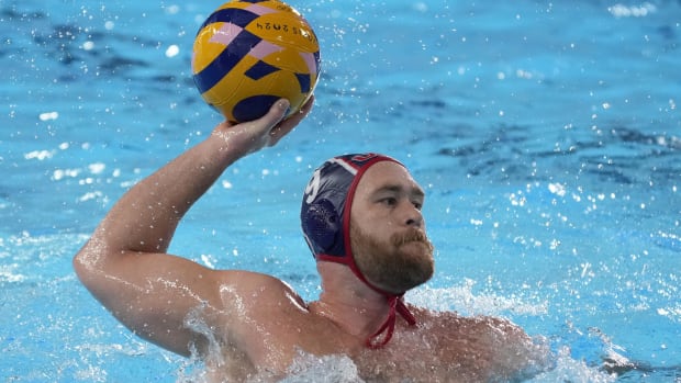 United States driver Alex Bowen (9) in action against Italy in a water polo group stage