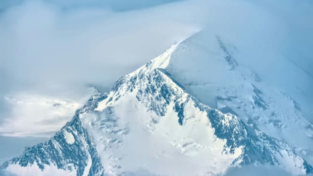 a picture of Denali in the clouds