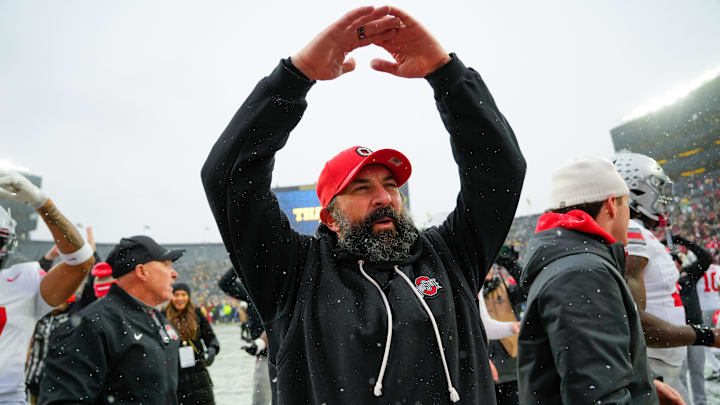 Ohio State Buckeyes defensive coordinator Matt Patricia celebrates after defeating the Michigan Wolverines in the NCAA football game at Michigan Stadium on Saturday, Nov. 29, 2025 in Ann Arbor, Michigan.