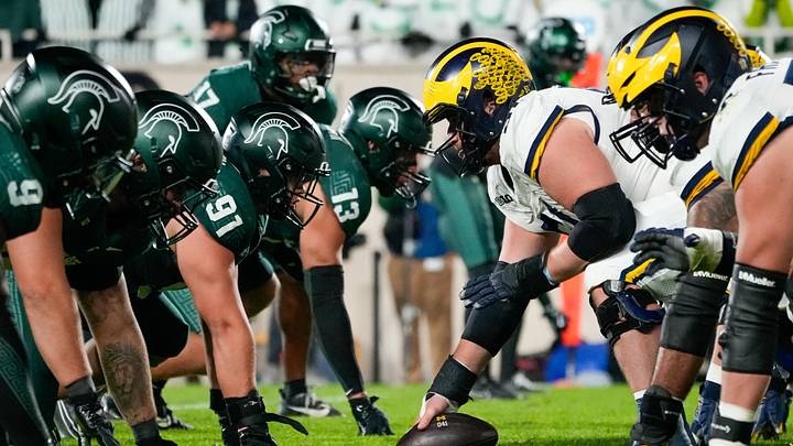 Oct 25, 2025; East Lansing, Michigan, USA; A view of the line of scrimmage during the first half of game between the Michigan State Spartans and the Michigan Wolverines at Spartan Stadium. Mandatory Credit: Brendan Mullin-Imagn Images
