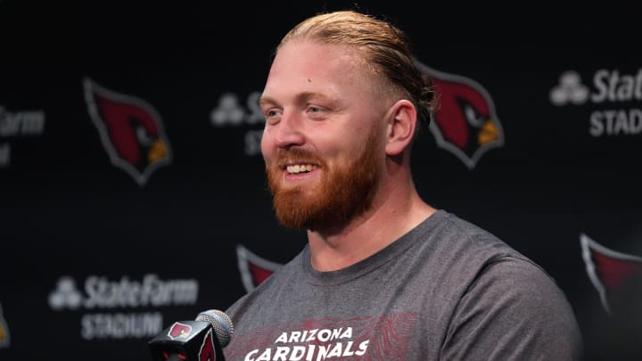 Arizona Cardinals center Hjalte Froholdt (72) speaks to the media during training camp at State Farm Stadium in Glendale on July 25, 2024.