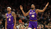 Mar 14, 2025; Phoenix, Arizona, USA; Phoenix Suns forward Kevin Durant (35) reacts alongside Bradley Beal (3) against the Sacramento Kings at Footprint Center. Mandatory Credit: Mark J. Rebilas-Imagn Images