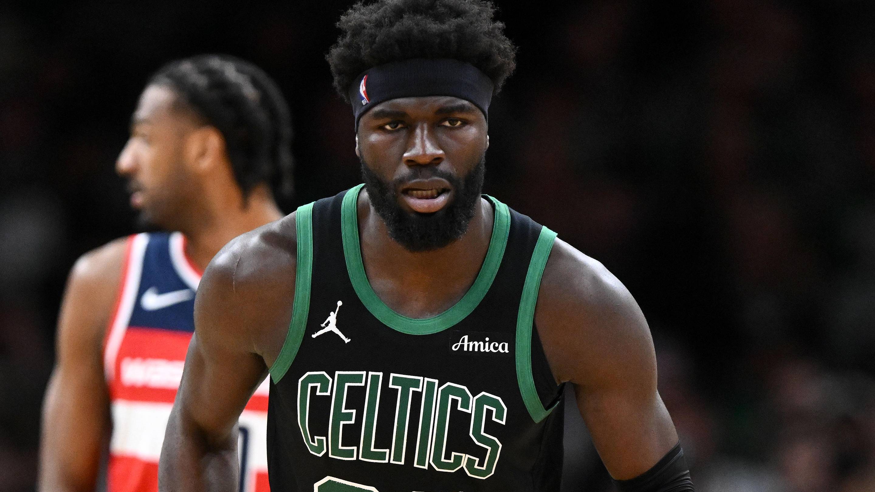 Mar 14, 2026; Boston, Massachusetts, USA; Boston Celtics center Neemias Queta (88) runs up the court during the first half of a game against the Washington Wizards at the TD Garden. Mandatory Credit: Brian Fluharty-Imagn Images