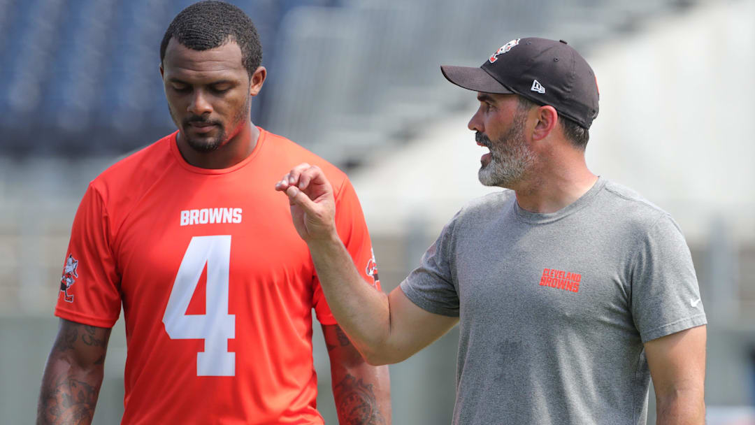 Cleveland Browns quarterback Deshaun Watson talks with head coach Kevin Stefanski after minicamp.