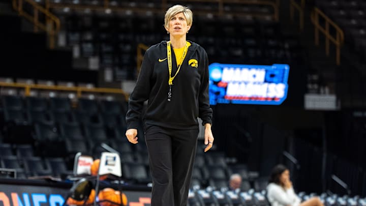 Iowa head coach Jan Jensen watches her team practice March 20, 2026 ahead of the Iowa Hawkeyes’ First Round NCAA Tournament game at Carver-Hawkeye Arena in Iowa City, Iowa.