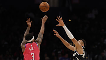 Mar 5, 2023; Washington, District of Columbia, USA; Washington Wizards guard Bradley Beal (3) shoots the ball as Milwaukee Bucks forward Giannis Antetokounmpo (34) defends in the third quarter at Capital One Arena. Mandatory Credit: Geoff Burke-Imagn Images
