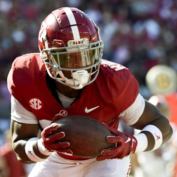 Apr 13, 2024; Tuscaloosa, AL, USA;  Alabama defensive back Dre Kirkpatrick Jr. (21) intercepts a pass during the A-Day scrimmage at Bryant-Denny Stadium. Mandatory Credit: Gary Cosby Jr.-Imagn Images
