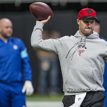 Dec 22, 2024; Atlanta, Georgia, USA; Atlanta Falcons quarterback Kirk Cousins (18) warms up on the field prior to the game against the New York Giants at Mercedes-Benz Stadium. Mandatory Credit: Dale Zanine-Imagn Images