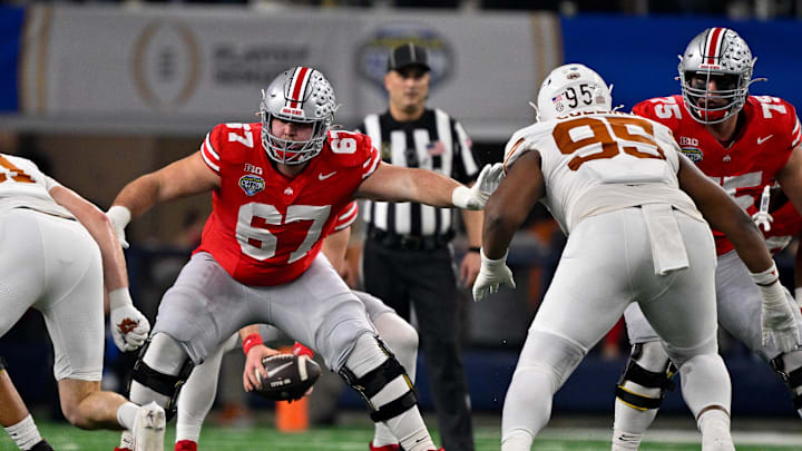 Jan 10, 2025; Arlington, TX, USA; Ohio State Buckeyes offensive lineman Austin Siereveld (67) in action during the game between the Texas Longhorns and the Ohio State Buckeyes at AT&T Stadium. Mandatory Credit: Jerome Miron-Imagn Images