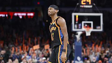 Jan 5, 2025; Oklahoma City, Oklahoma, USA; Oklahoma City Thunder guard Shai Gilgeous-Alexander (2) reacts after scoring against the Boston Celtics during the fourth quarter at Paycom Center. Mandatory Credit: Alonzo Adams-Imagn Images