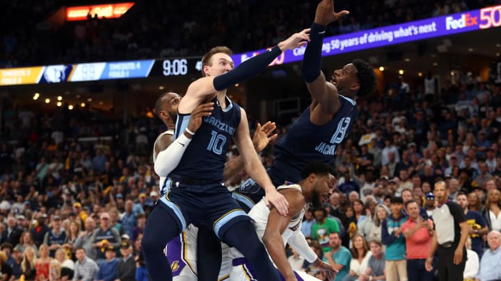 Apr 16, 2023; Memphis, Tennessee, USA; Memphis Grizzlies guard Luke Kennard (10) and forward Jaren Jackson Jr. (13) and Los Angeles Lakers guard Malik Beasley (5) battle for a rebound during the second halfduring game one of the 2023 NBA playoffs at FedExForum. Mandatory Credit: Petre Thomas-USA TODAY Sports