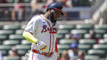 Aug 25, 2024; Cumberland, Georgia, USA; Atlanta Braves designated hitter Marcell Ozuna (20) reacts after being hit by a foul ball against the Washington Nationals during the eighth inning at Truist Park. Mandatory Credit: Dale Zanine-USA TODAY Sports