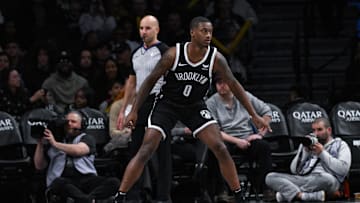 Nov 25, 2023; Brooklyn, New York, USA; Brooklyn Nets prospect Dariq Whitehead (0) during his NBA debut in the fourth quarter against the Miami Heat at Barclays Center. Mandatory Credit: John Jones-Imagn Images