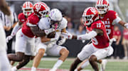 Western Illinois Leathernecks wide receiver Demari Davis (3) catches the ball while Indiana Hoosiers defensive back Shawn Asbury II (1) defends in the first quarter at Memorial Stadium.