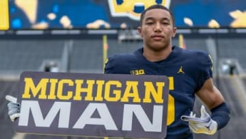 Four-star Washington (D.C.) Gonzaga safety Kainoa Winston poses at Michigan Stadium while officially visiting the Wolverines