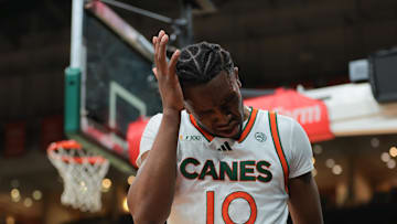 Jan 11, 2025; Coral Gables, Florida, USA; Miami Hurricanes guard Paul Djobet (10) reacts after driving to the basket against the Wake Forest Demon Deacons during the first half at Watsco Center. Mandatory Credit: Sam Navarro-Imagn Images