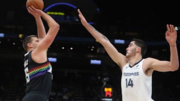 Denver Nuggets center Nikola Jokic appeared to inadvertently make contact with Memphis Grizzlies center Zach Edey, forcing the 7-foot-4 second-year center to make an early exit. 