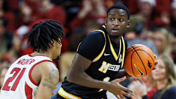 Missouri Tigers guard Marques Warrick (1), looks to make a pass in a game against the Arkansas Razorbacks this season.
