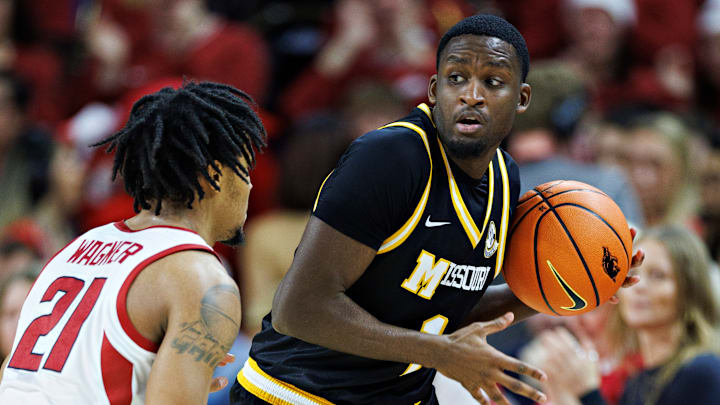 Missouri Tigers guard Marques Warrick (1), looks to make a pass in a game against the Arkansas Razorbacks this season.