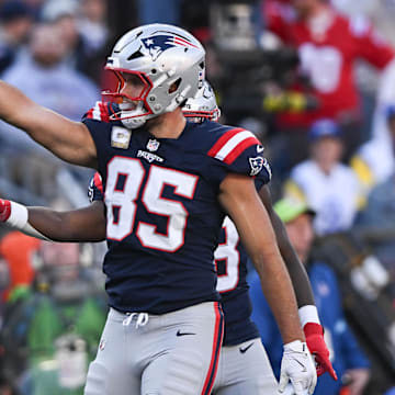 Nov 17, 2024; Foxborough, Massachusetts, USA; New England Patriots tight end Hunter Henry (85) reacts after a first down against the Los Angeles Rams during the first half at Gillette Stadium. Mandatory Credit: Brian Fluharty-Imagn Images